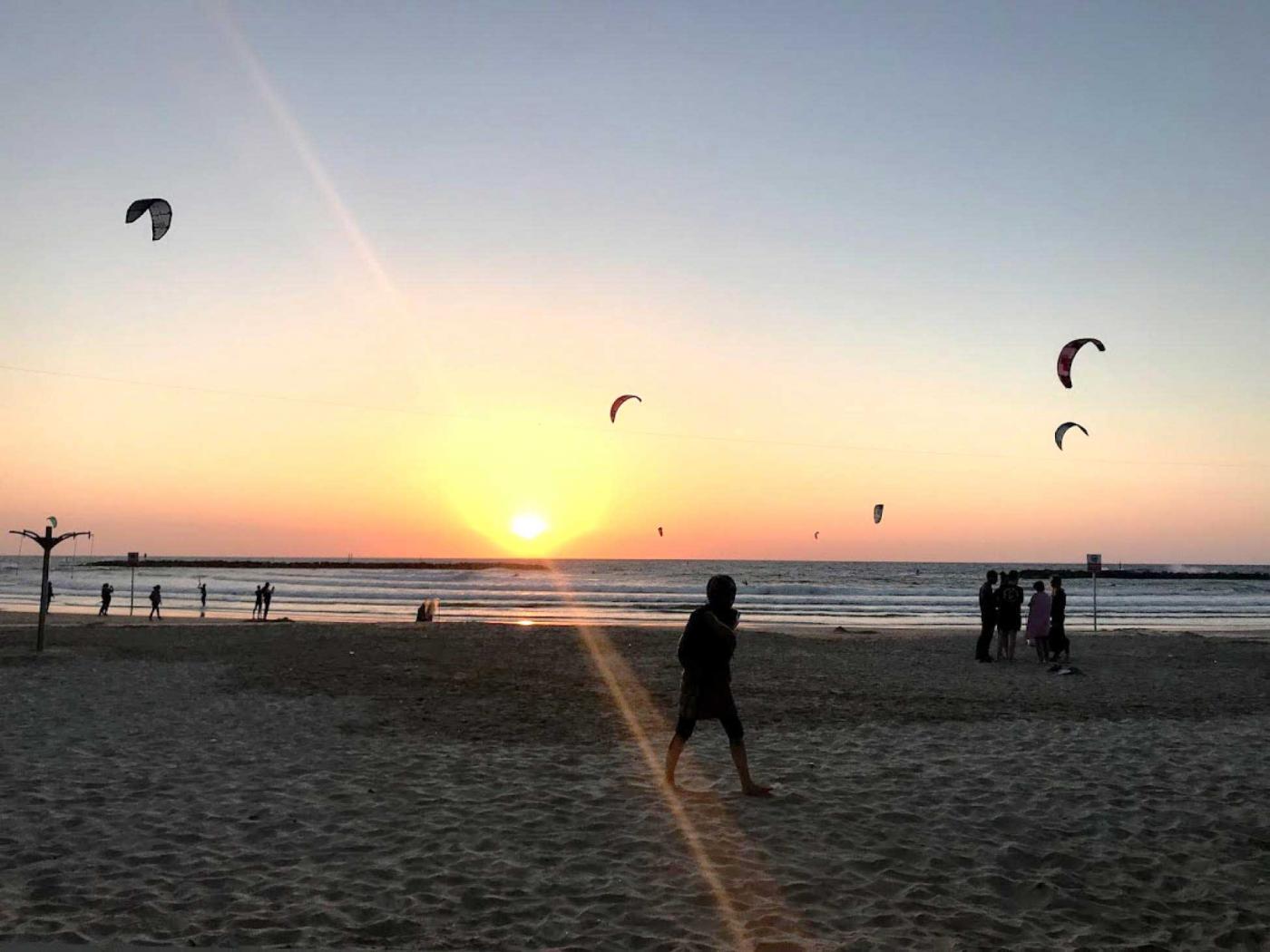 Windsurfers on Shabbat. Saturdays are the busiest time for Israel&rsquo;s beaches; people of all ages come to enjoy the day off.  